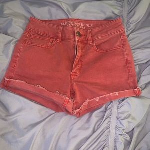 Red american eagle shorts.